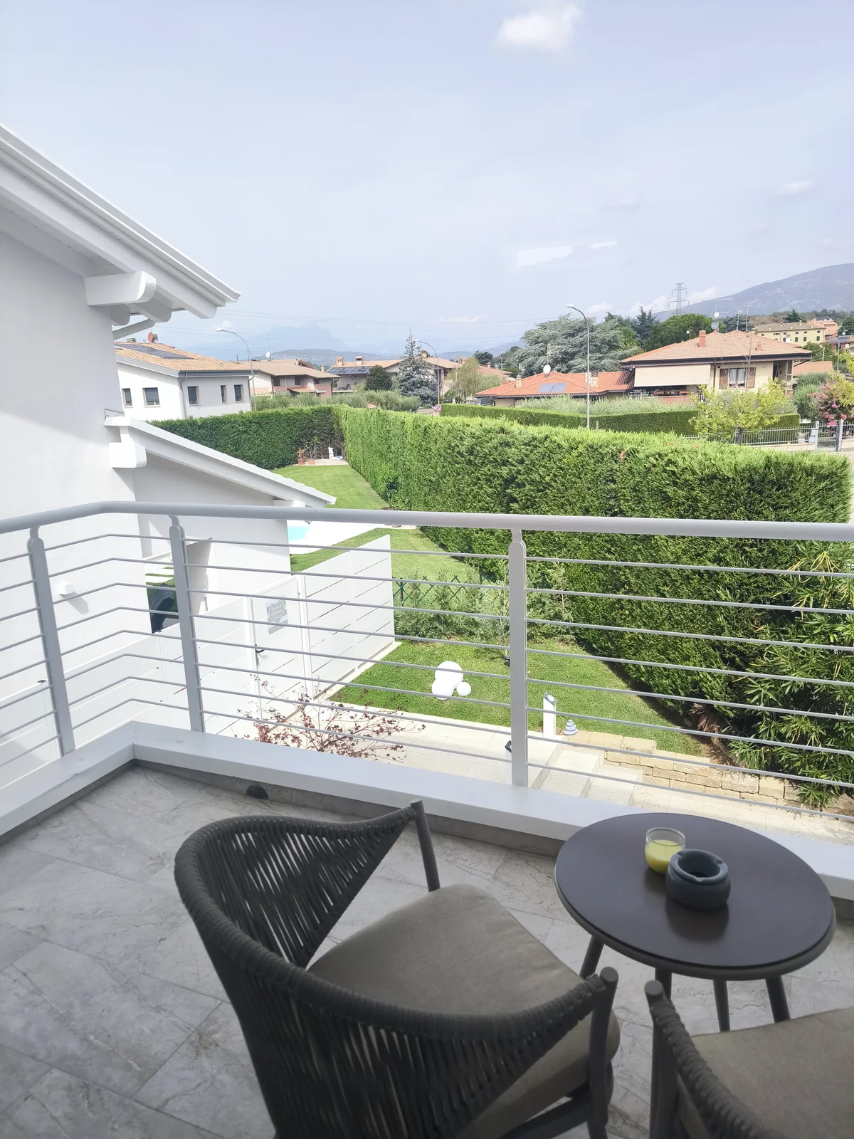 Private balcony of the Dolce Vita room overlooking the Harmony Affi garden