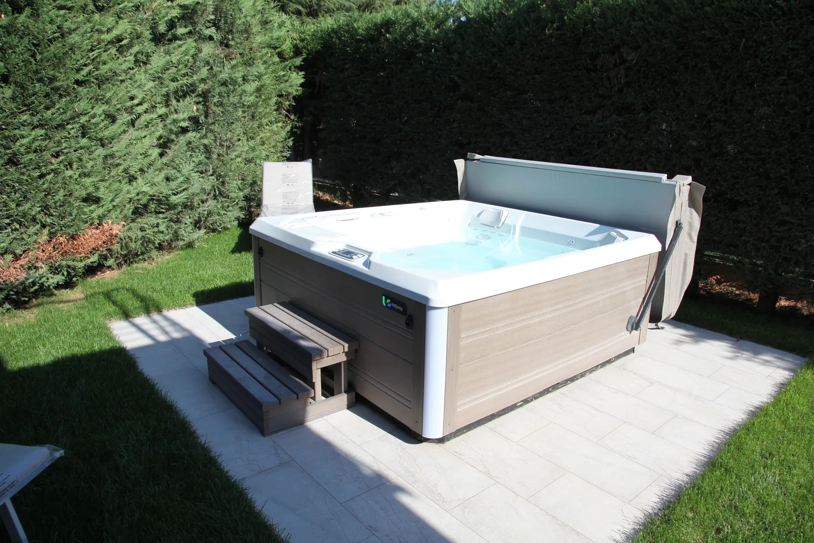Outdoor hot tub in the private garden at Harmony Affi
