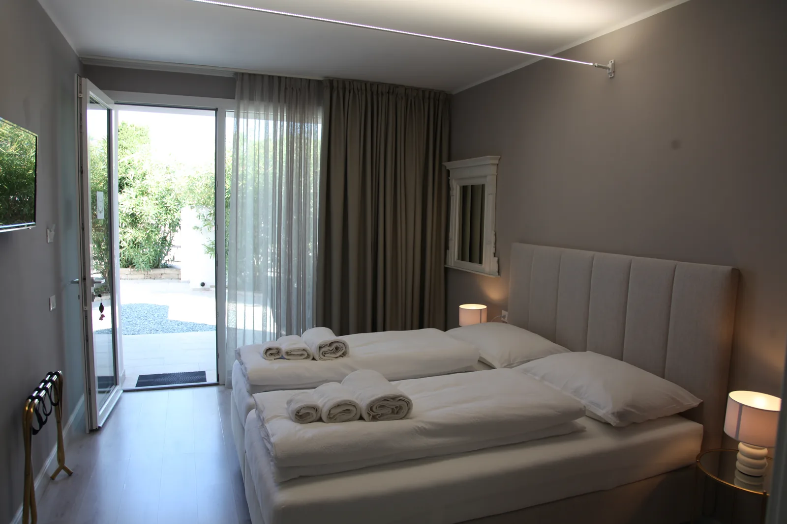 Rosa double room with twin beds and direct garden entrance